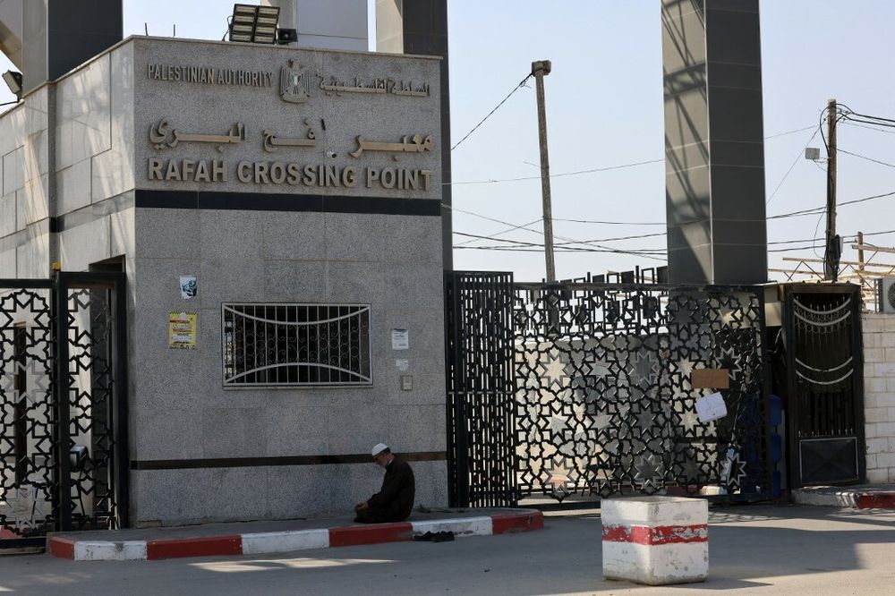 A picture taken on October 10, 2023, shows the closed gates of the Rafah border crossing with Egypt. 