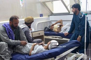 Injured Afghan people receive treatment at a hospital after an earthquake in Afghanistan's Jalalabad on September 1, 2025