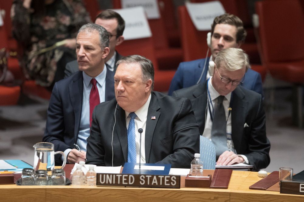 U.S. Secretary of State Mike Pompeo and U.S. Special Representative for Iran Brian Hook (2R) at a Security Council meeting on Iran's compliance with the 2015 nuclear agreement, Wednesday, Dec. 12, 2018