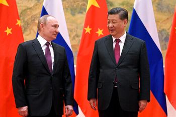 Russia's President Vladimir Putin (L) and Chinese President Xi Jinping in Beijing, China, February 4, 2022.