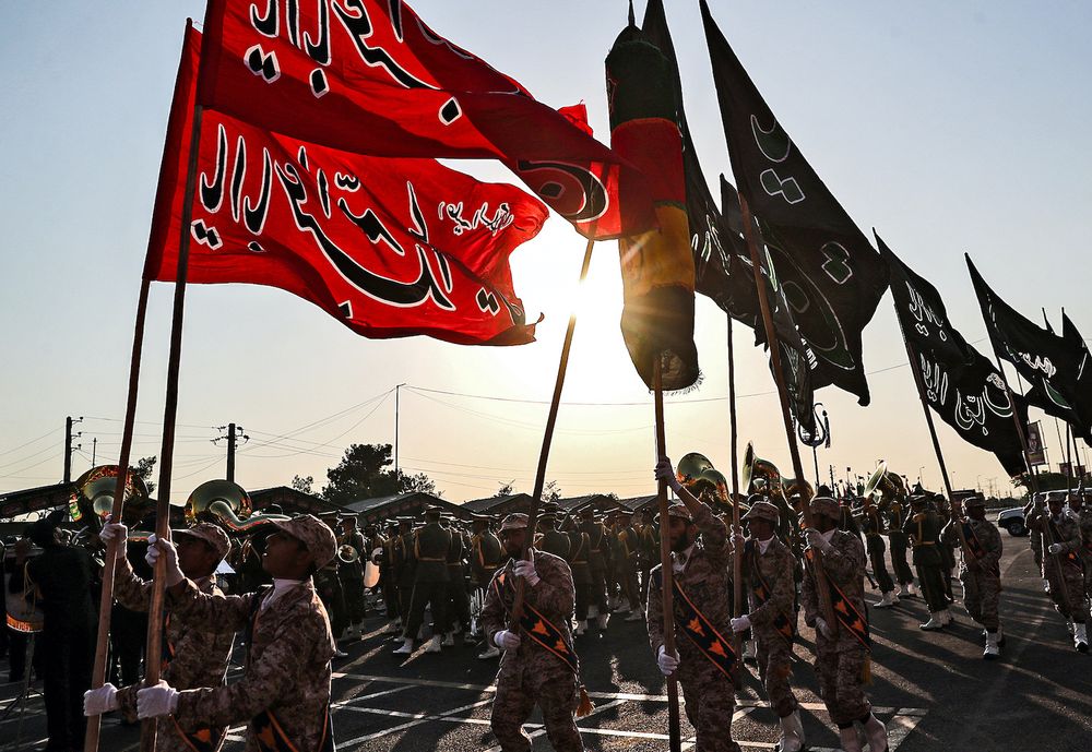 Members of Iran's Islamic Revolutionary Guard Corps (IRGC) marching during the annual "Sacred Defence Week" military parade in Tehran, Iran.