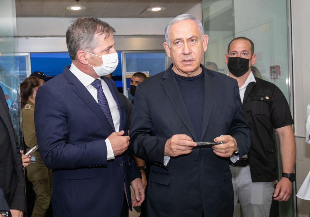 Israel's Prime Minister Benjamin Netanyahu visits Israelis wounded in rocket attacks, at the Wolfson Hospital in Holon, Israel on May 12, 2021.