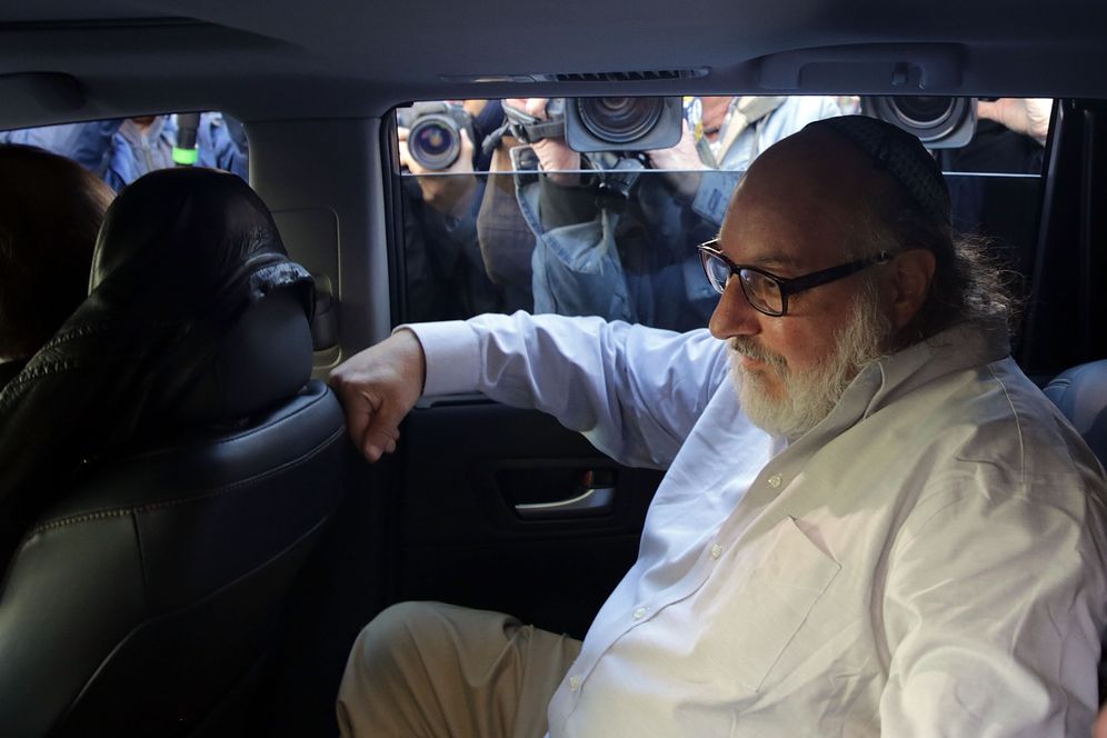 FILE - Jonathan Pollard, the American convicted of spying for Israel, sits in a car after leaving a New York court house following his release from prison after 30 years on November 20, 2015 in New York, New York.