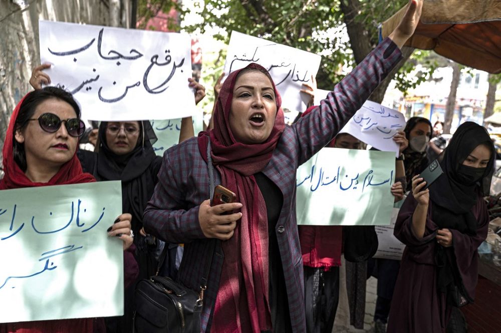 Members of Afghanistan's Powerful Women Movement, take part in a protest in Kabul, Afghanistan, on May 10, 2022.