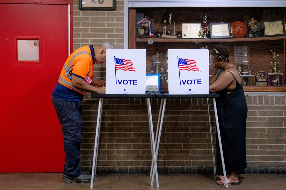People vote in the primary election at Northwestern High School in Detroit, Tuesday, Aug. 4, 2026. 