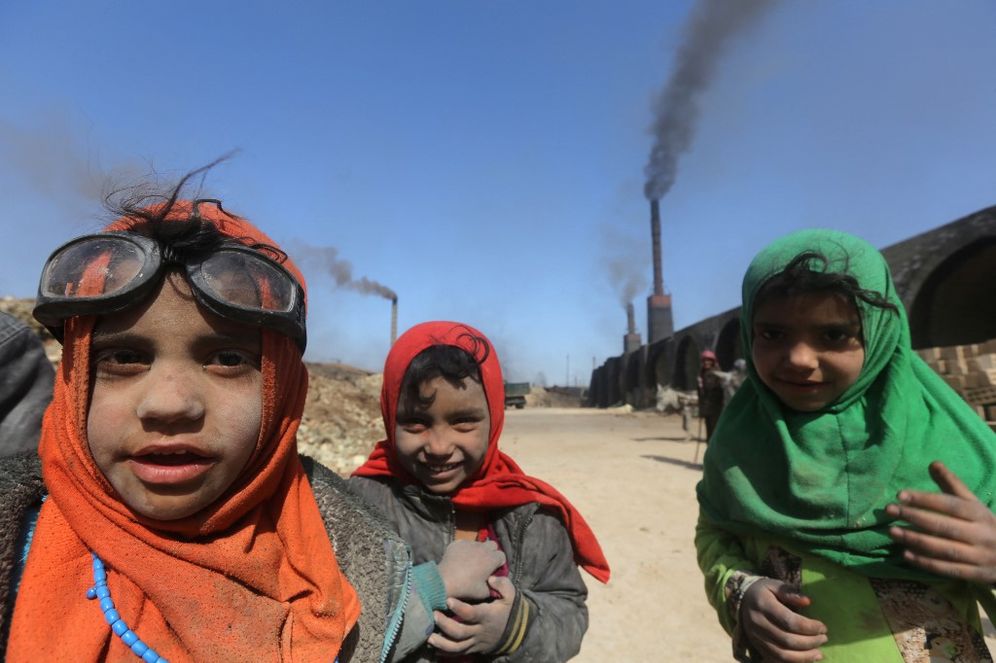 Iraqi children employed at the traditional brick factory of Nahrawan, Iraq.