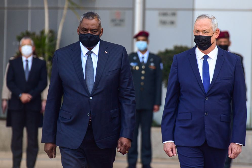US Secretary of Defense Lloyd Austin (left) and Minister of Defense Benny Gantz during a ceremony at Kirya military base in Tel Aviv on April 11, 2021