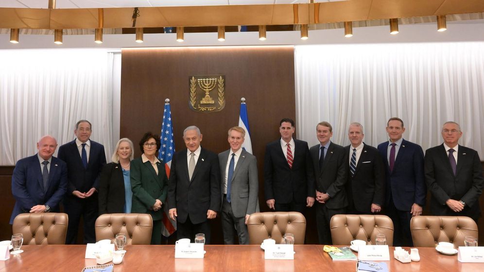 Israel's Prime Minister Benjamin Netanyahu (C) meets with a bipartisan group of U.S. senators in Jerusalem, on January 18, 2023.