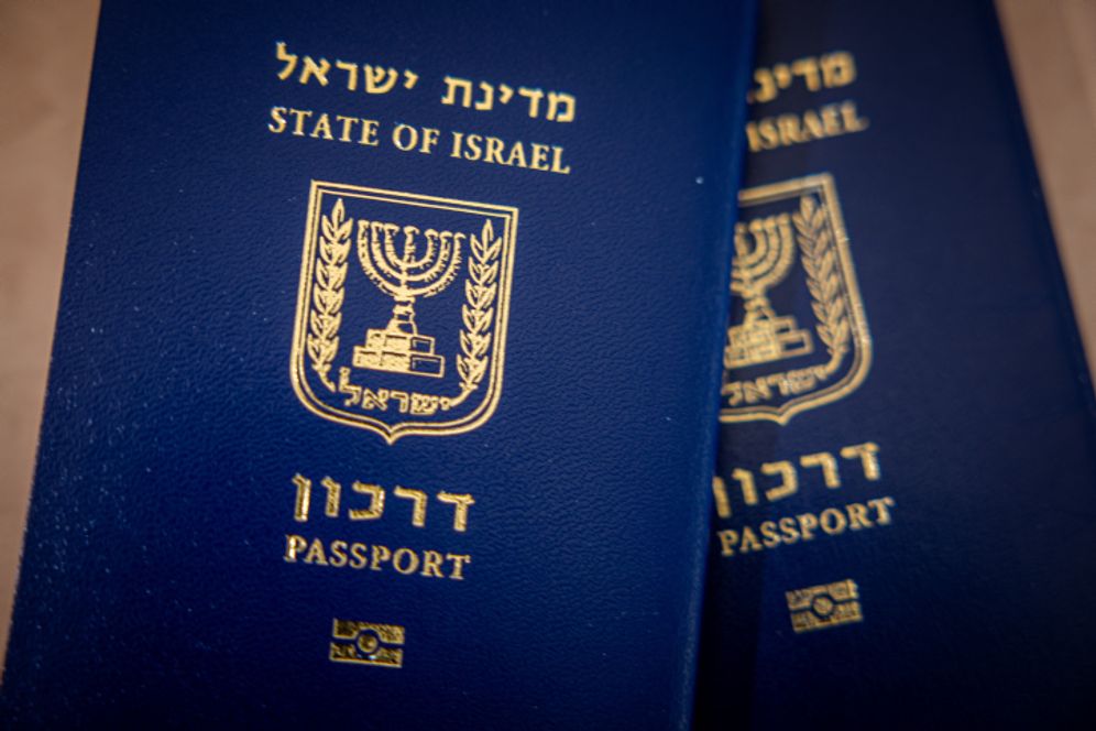 An illustration picture shows Israeli passports in Jerusalem.