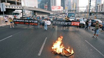 Protestors on Ayalon highway in Israel rallying for Israel to end the war with Hamas and bring back the Israeli hostages 