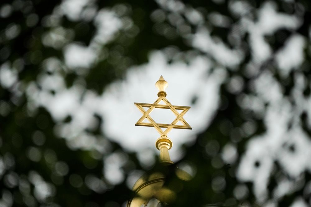 The sun shines on the Star of David on top of the 'New Synagogue' in central Berlin, Germany.