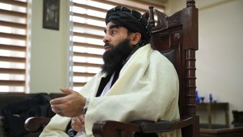 Taliban spokesman Zabihullah Mujahid speaks during an interview with AFP in Kabul on January 22, 2022.