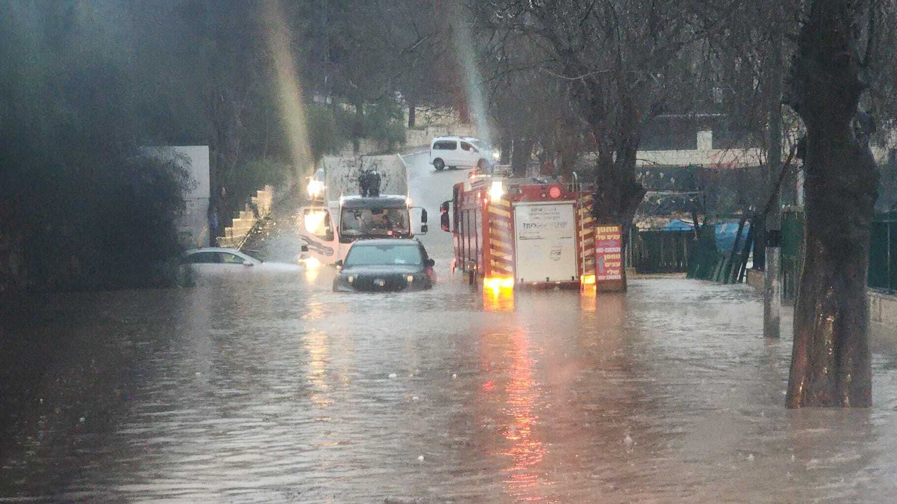 Woman killed in Jerusalem flood, others stranded during storm