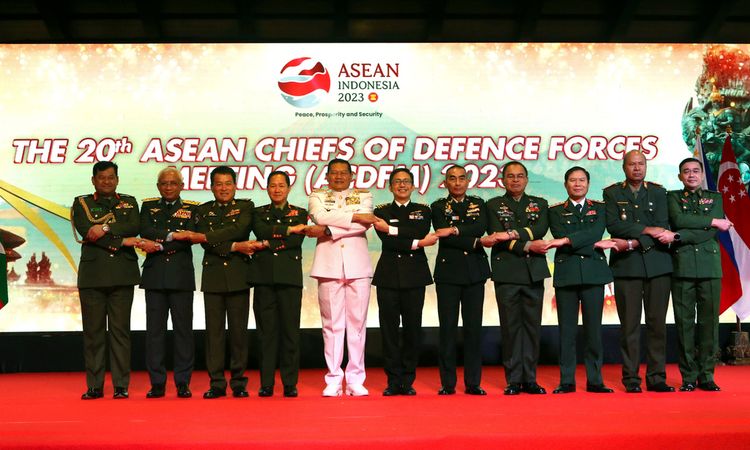 Representatives pose for photos during the Association of Southeast Asian Nations Chiefs of Defense Forces meetings in Nusa Dua, Bali, Indonesia.