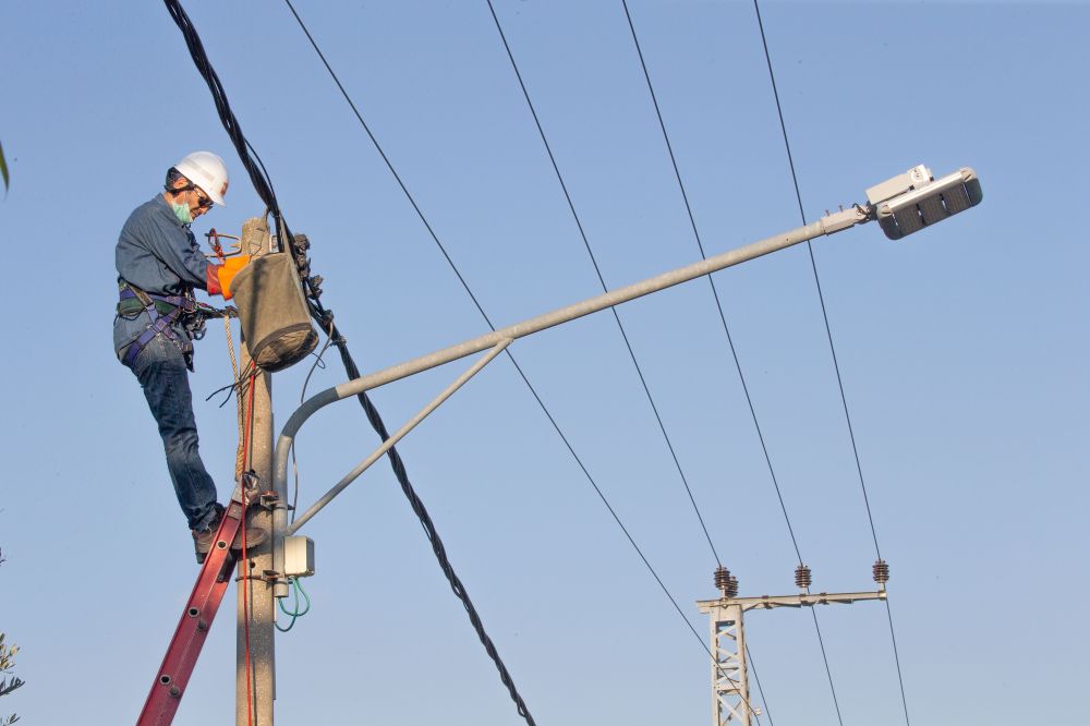 A worker from the Israeli Electric Company seen repairing a fault in the electricity networks