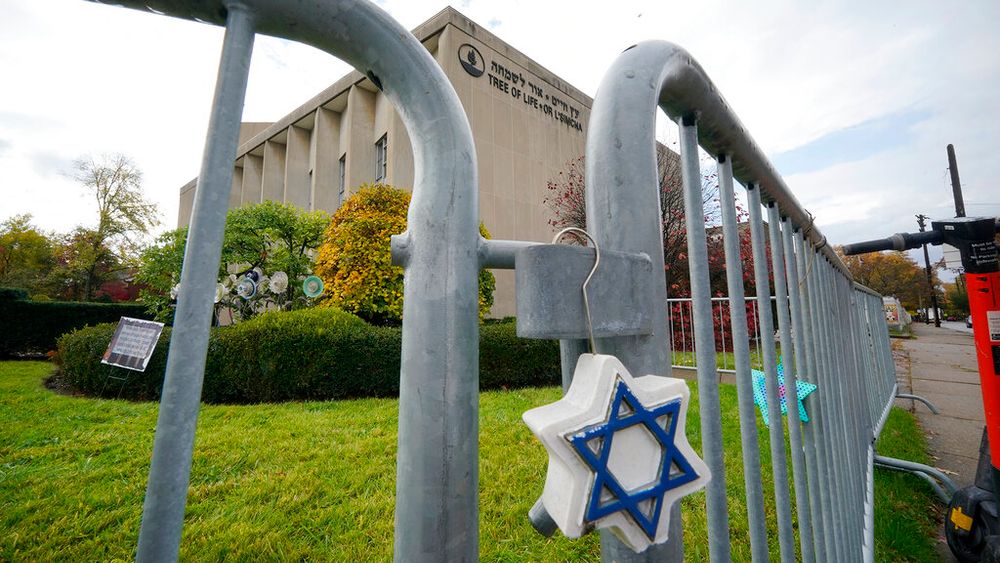A Star of David hangs from a fence outside the dormant landmark Tree of Life synagogue in Pittsburgh's Squirrel Hill neighborhood, United States, October 26, 2022.