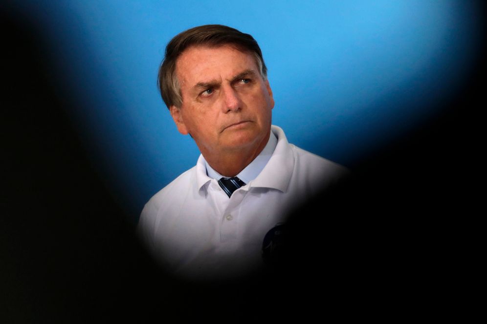 AP/Eraldo Peres 2021 © FILE - Brazil's President Jair Bolsonaro attends a ceremony at the Planalto presidential palace in Brasilia, Brazil, on January 12, 2021.