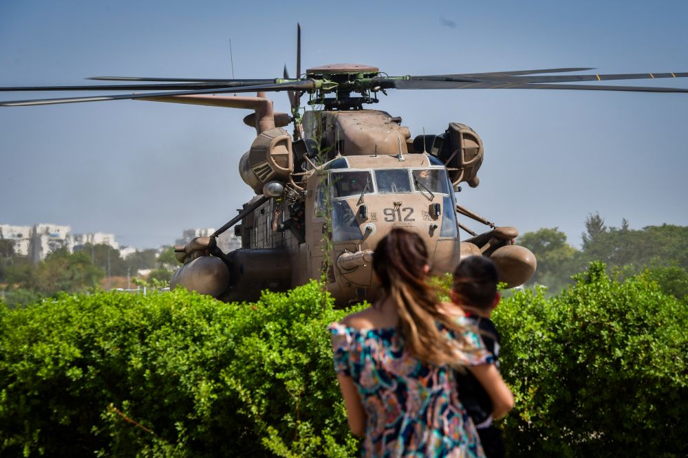 A military helicopter carrying fighters who participated in the rescue operation of Israeli hostages from the Gaza Strip seen at the Sheba Medical Center in Ramat Gan