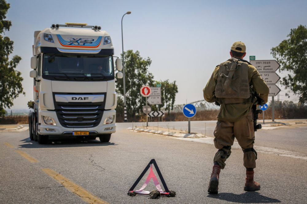 Israeli soldiers block roads near Israel's border with the Gaza Strip, on August 2, 2022.