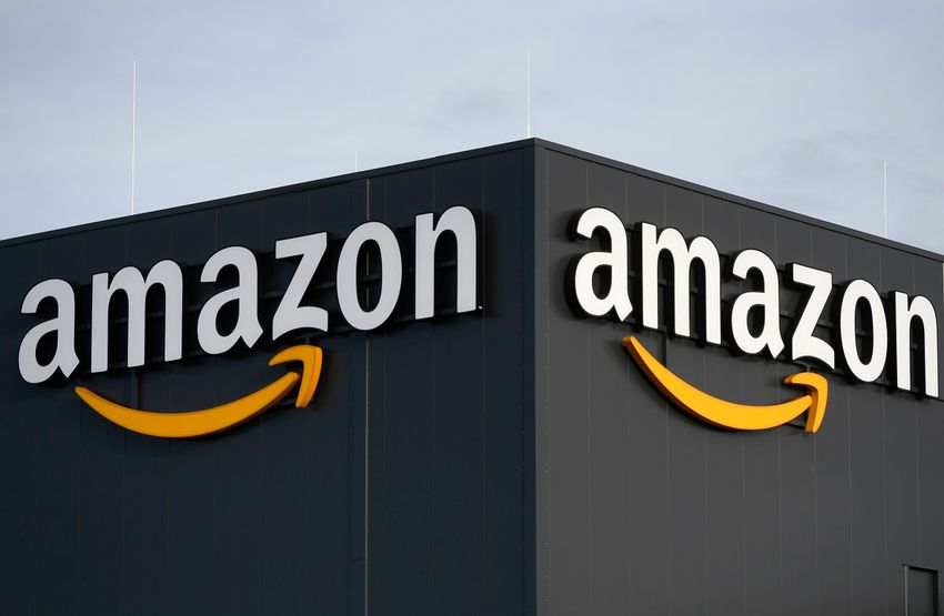 FILE - This file photo taken on December 17, 2019 shows the logo of US online retail giant Amazon at the distribution center in Moenchengladbach, western Germany