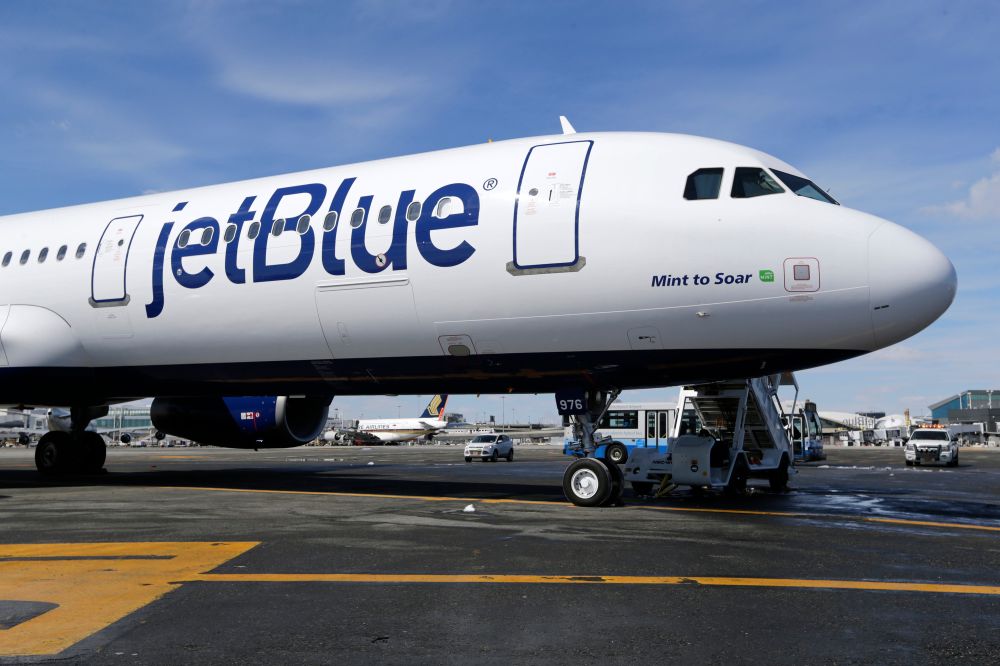 FILE - A JetBlue airplane is shown at John F. Kennedy International Airport in New York, March 16, 2017.