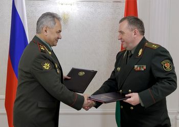 Russian Defense Minister Sergei Shoigu (L) and his Belarusian counterpart Viktor Khrenin in Minsk, Belarus.