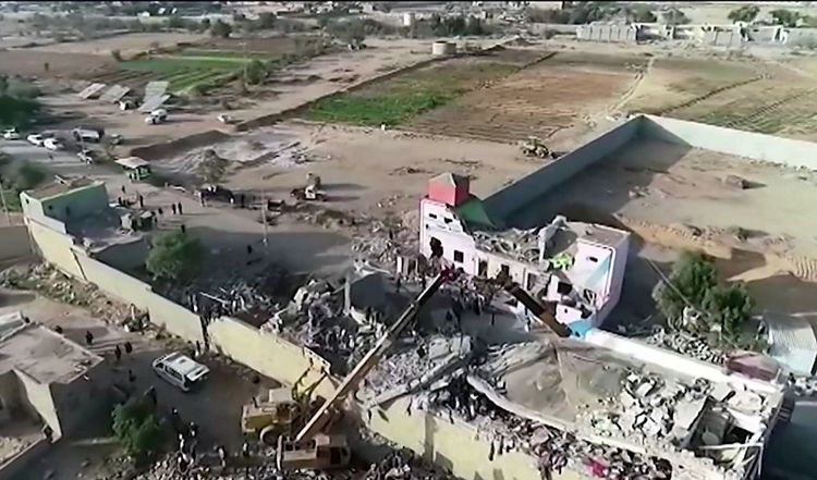 This image grab from a handout video made available by the Ansarullah Media center on January 21, 2022 shows destruction at a prison in the Houthi rebel stronghold of Saada, Yemen.