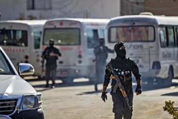 Members of Kurdish security forces in the Kurdish-majority city of Qamishli in the northeastern Hasakeh province, Syria, on July 25, 2022.