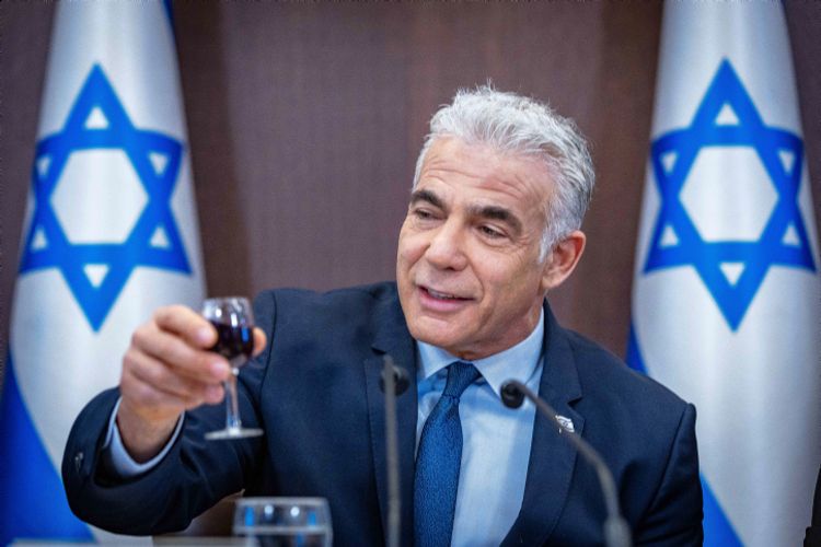 Israeli Prime Minister Yair Lapid leads a cabinet meeting at the Prime Minister's Office in Jerusalem on September 18, 2022.