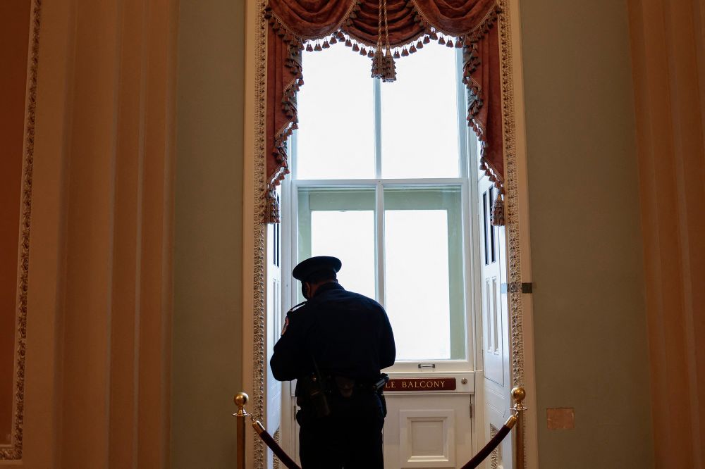 A US Capitol Police Officer looks out a window in the US Capitol building on January 5, 2022 in Washington DC, United States.