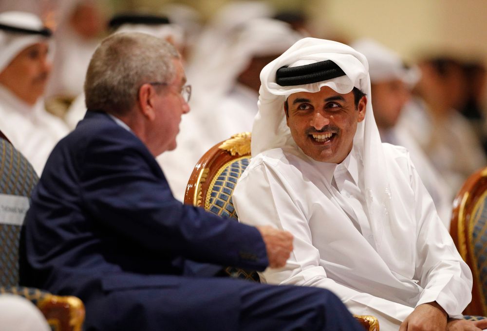 Emir of Qatar Sheikh Tamim bin Hamad Al Thani speaks to IOC President Thomas Bach ahead of the opening ceremony for the World Athletics Championships on the Corniche in Doha, Qatar, September 27, 2019.