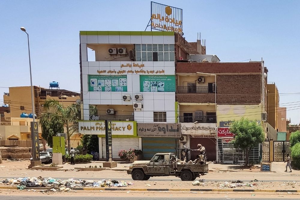A vehicle of the paramilitary Rapid Support Forces drives down al-Sittin road in Khartoum, Sudan.