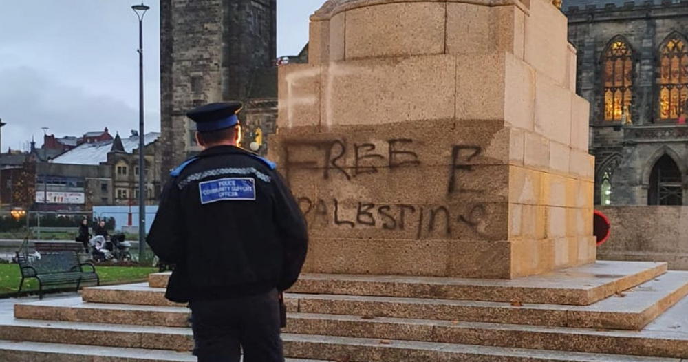 Rochdale Cenotaph with the words 'Free Palestine' spray painted across it