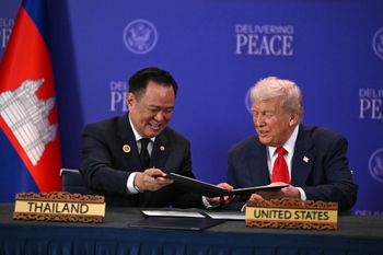 US President Donald Trump speaks with Thailand's Prime Minister Anutin Charnvirakul during a ceremonial signing of a ceasefire agreement between Cambodia and Thailand on the sidelines of the 47th ASEAN Summit in Kuala Lumpur on October 26, 2025