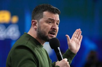 Ukrainian President Volodymyr Zelenskyy answers media questions during a press conference in Kyiv, Ukraine