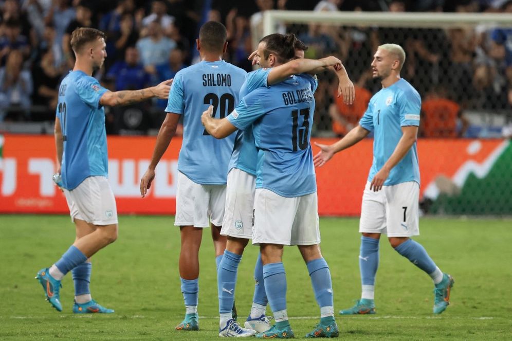 Israeli players celebrate their 2-1 victory against Albania at Bloomfield Stadium in Tel Aviv, Israel, September 24, 2022.