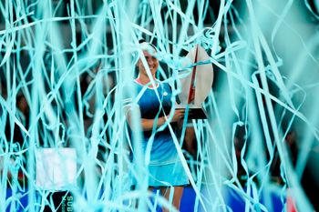Ons Jabeur holds the winner's trophy at the end of the women's final at the Mutua Madrid Open tennis tournament in Madrid, Spain, on May 7, 2022.