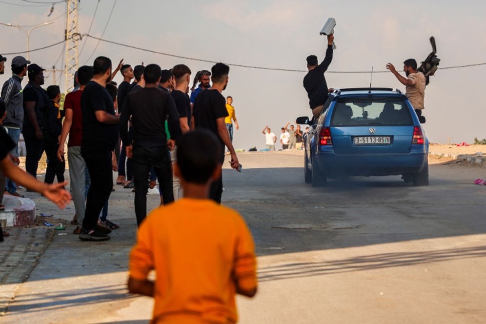 Atia Mohammed/Flash90 Palestinians at the Erez Crossing, also known as the Beit Hanoun Crossing, between Israel and the northern Gaza Strip, after the Hamas have launched a large attack on Israel, October 7, 2023