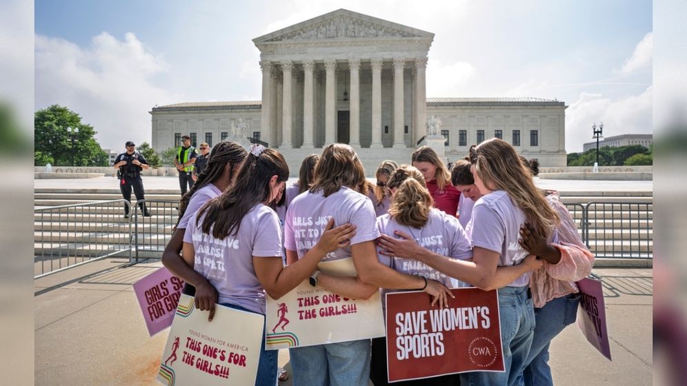 Activists and protesters from Concerned Women for America, a conservative evangelical group, pray outside the Supreme Court