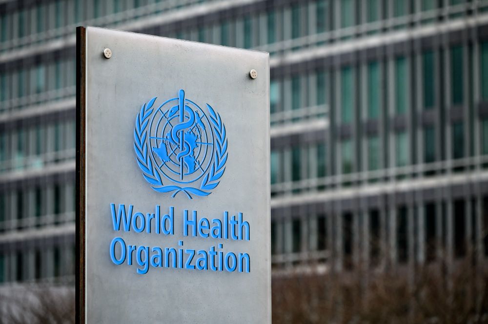 This file photograph taken on December 2, 2021, shows a sign of the World Health Organization  next to their headquarters in Geneva, Switzerland.