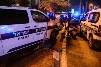 Police at a crime scene in Holon