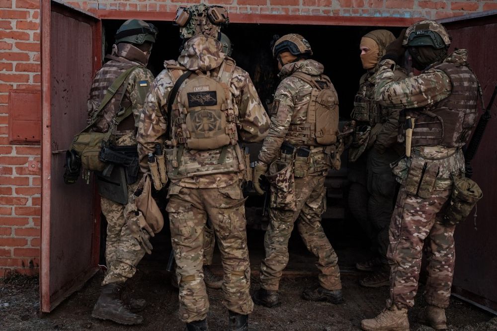 Ukraine Army servicemen gather as they prepare to leave for the frontline, at a rest and recovery base, in the Donetsk region of Ukraine.