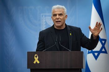File photo of Opposition Leader Yair Lapid at a Yesh Atid party meeting