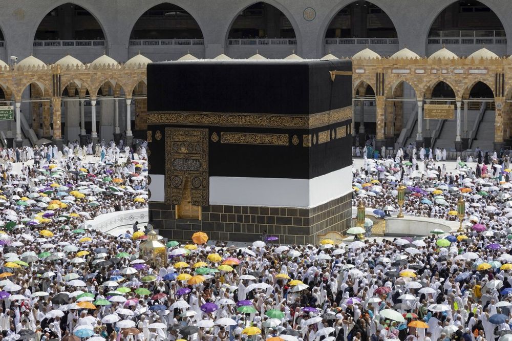 Worshippers circumambulate the Kaaba, Islam's holiest shrine, at the Grand mosque in the holy Saudi city of Mecca.