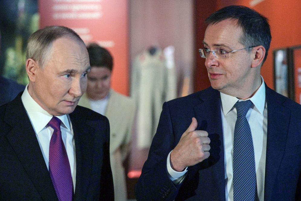 Russian President Vladimir Putin, left, and Presidential Aide Vladimir Medinsky