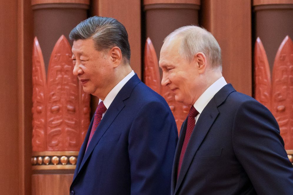 Maxim Stulov, Sputnik, Kremlin Pool Photo via AP Russian President Vladimir Putin, right, and Chinese President Xi Jinping walk to attend the talks at the Great Hall of the People in Beijing Wednesday, May 20, 2026.