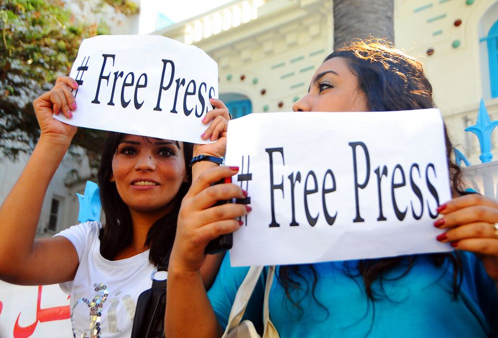 Journalists demonstrate outside the national journalists' union to demand more freedom in the press, in Tunis, Tunisia, on October 17, 2012.
