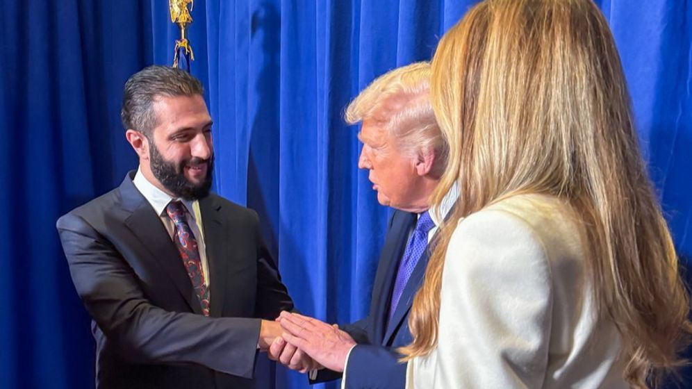 Presidency of the Syrian Arab Republic US President Donald Trump shakes hands with Syrian President Al-Sharaa in the presence of the First Lady Melania on the sidelines of the UNGA