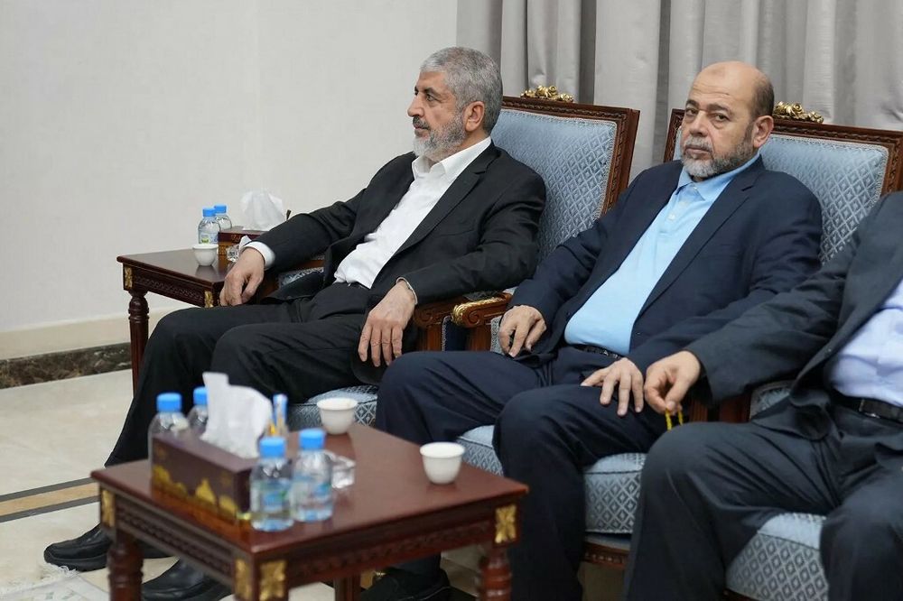 Hamas leader Khaled Mashaal and senior Hamas member Moussa Abu Marzouk during a meeting in Doha.