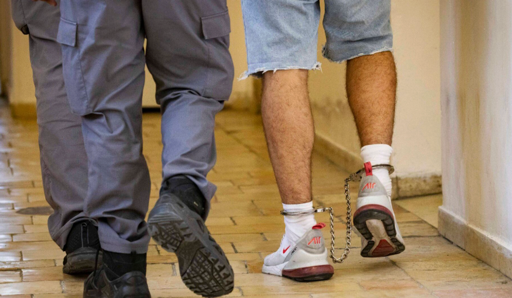 Olivier Fitoussi/Flash90 File- 18 year-old convict led to court